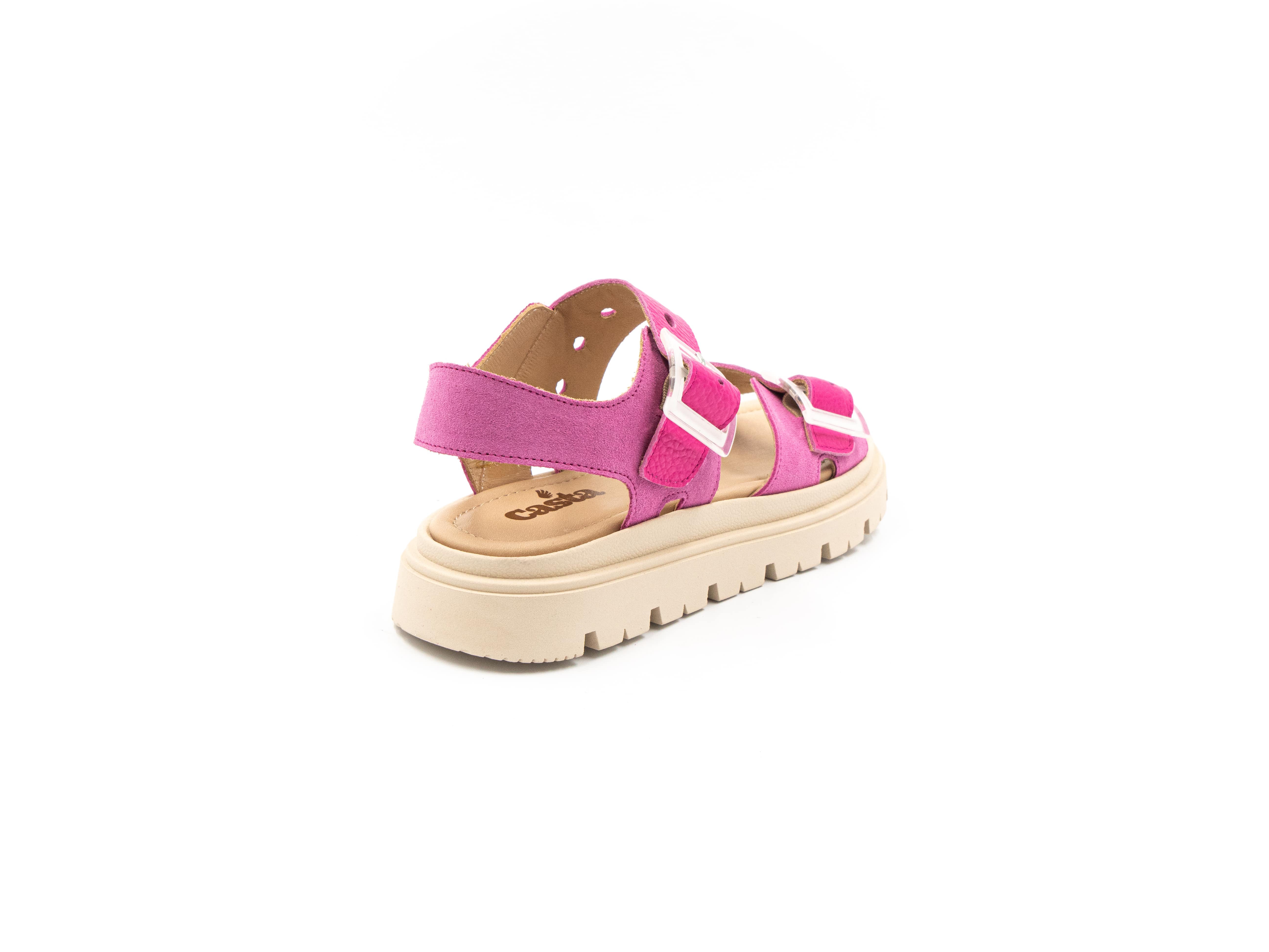 Flat sandals in shades of pink.