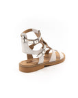 Roman-style sandals in shades of beige.