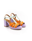 Heeled sandals in violet, orange and aqua green.