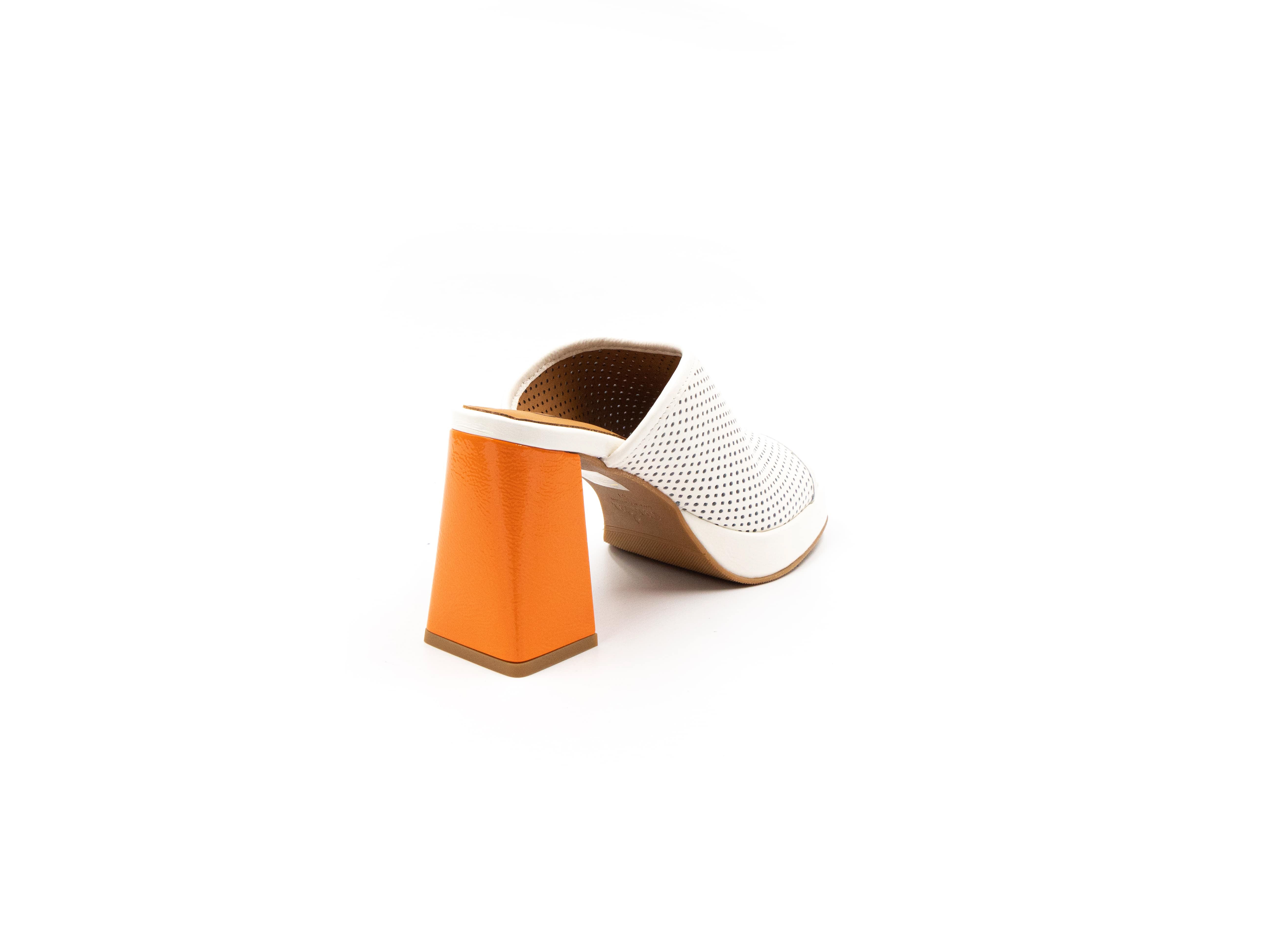 Perforated mules in white and orange.