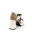 Heeled sandals in black, white and brown.