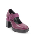 Purple platform shoe with a black block heel on a white background