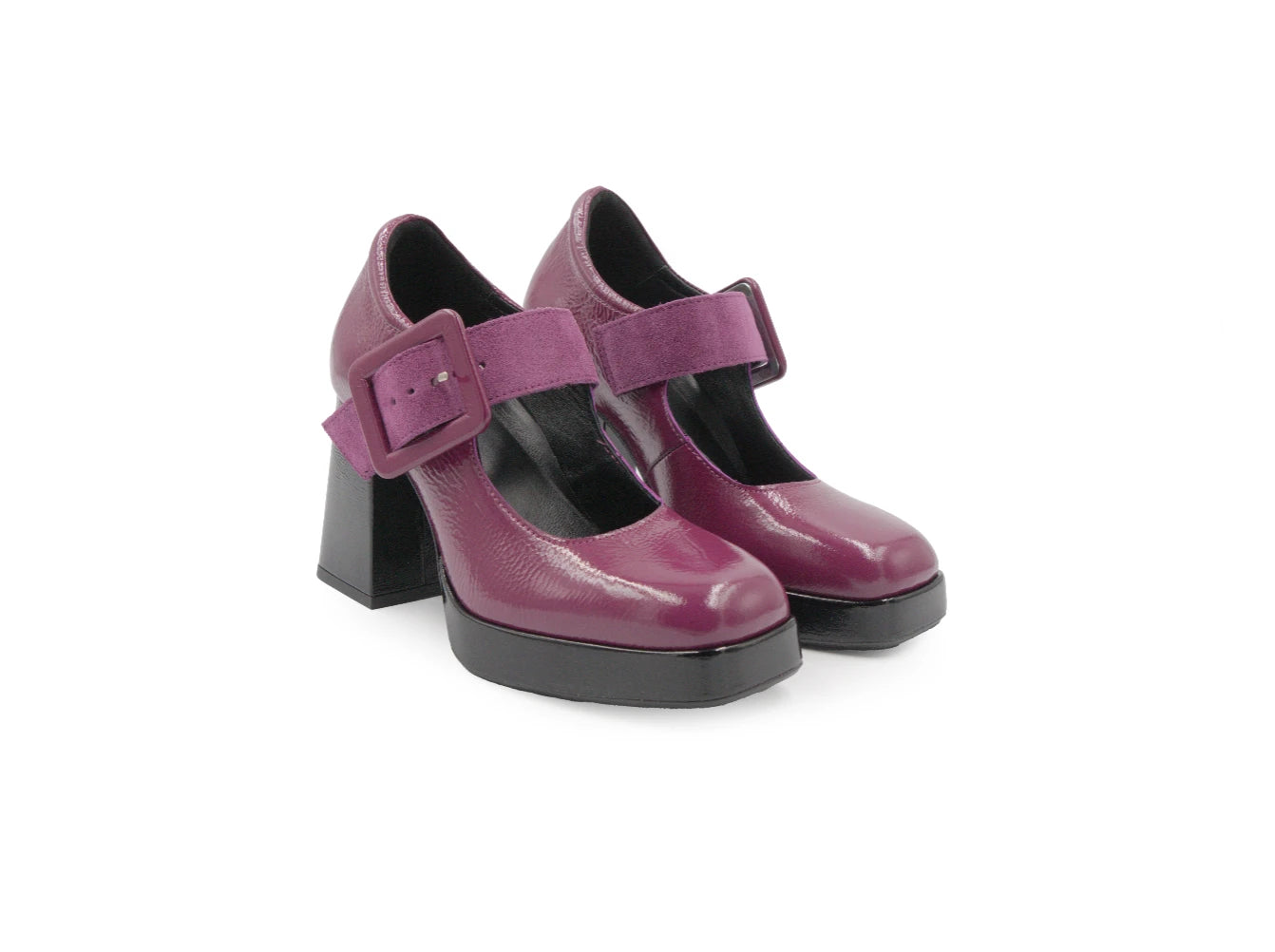 Purple high-heeled shoes with buckles on a white background