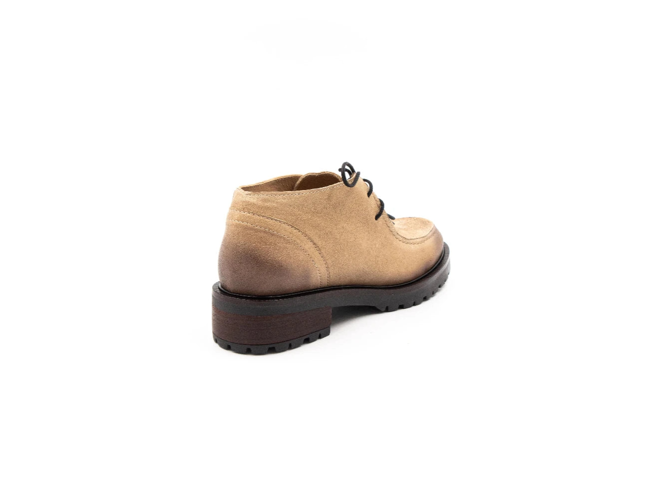 Beige leather shoe on a white background
