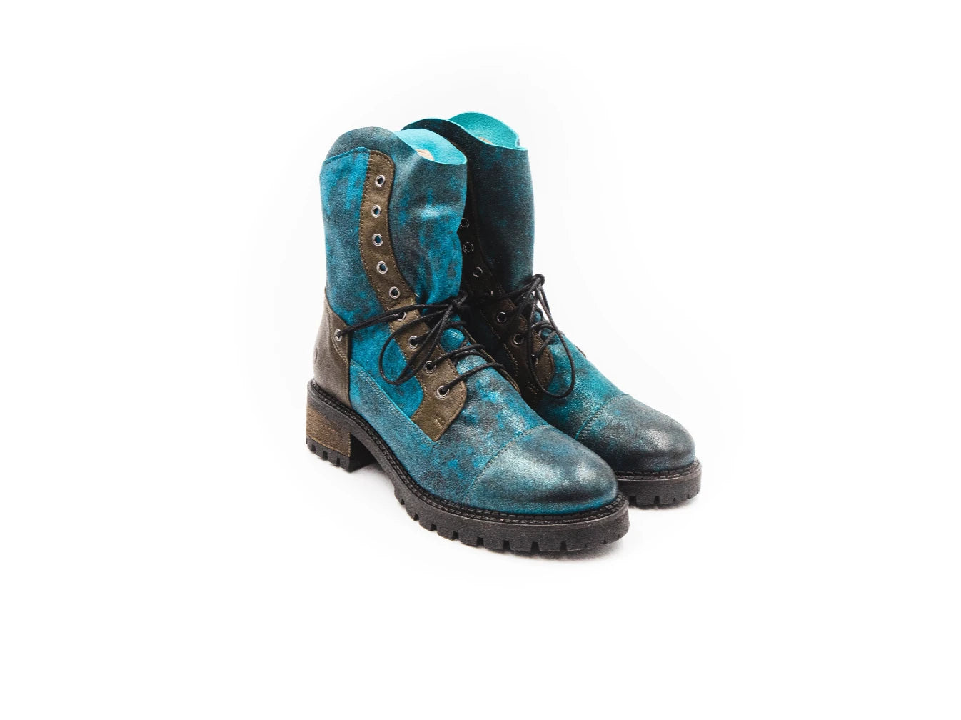 Pair of blue and black leather boots on a white background
