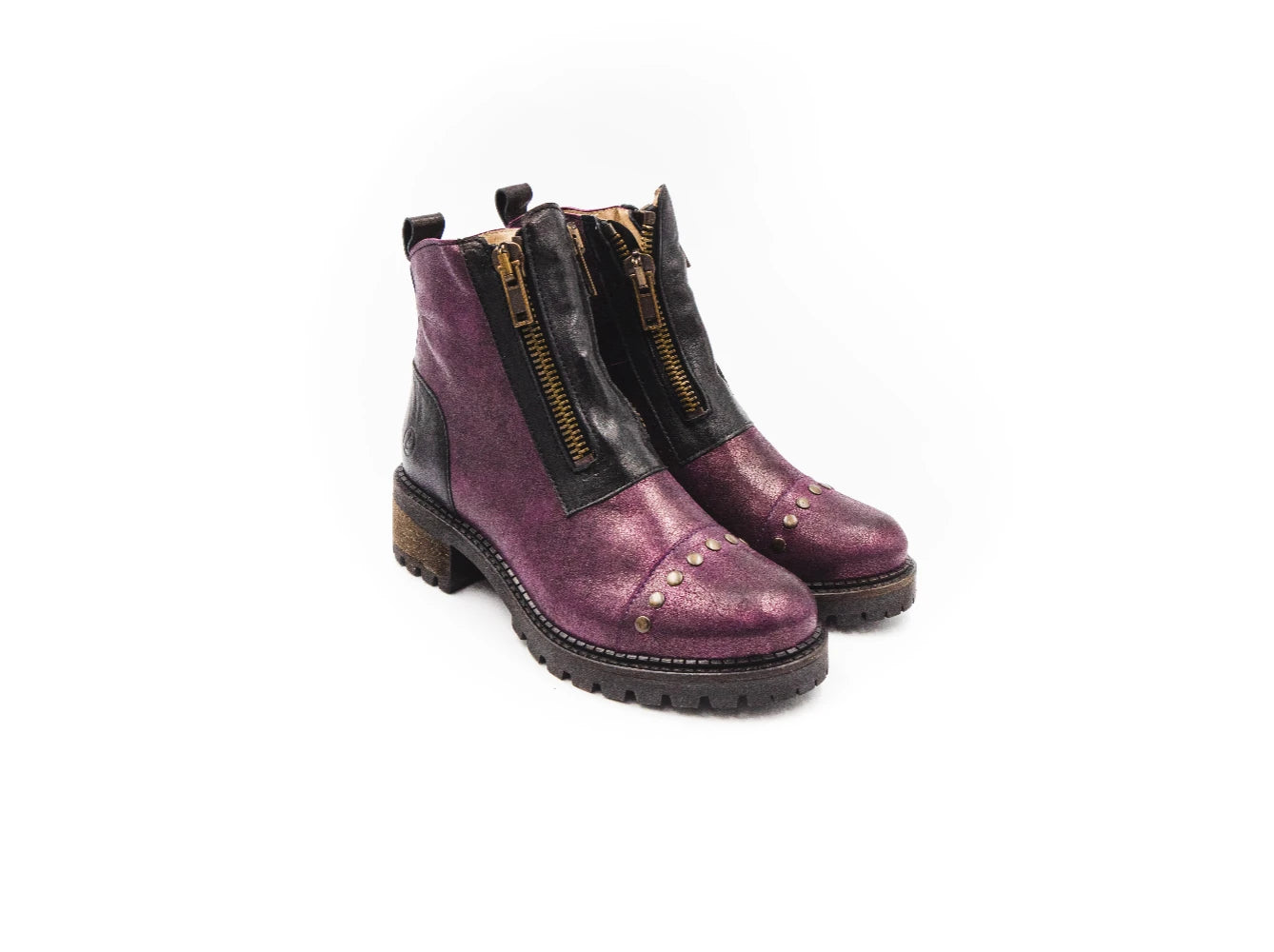 Pair of purple leather boots with zippers on a white background