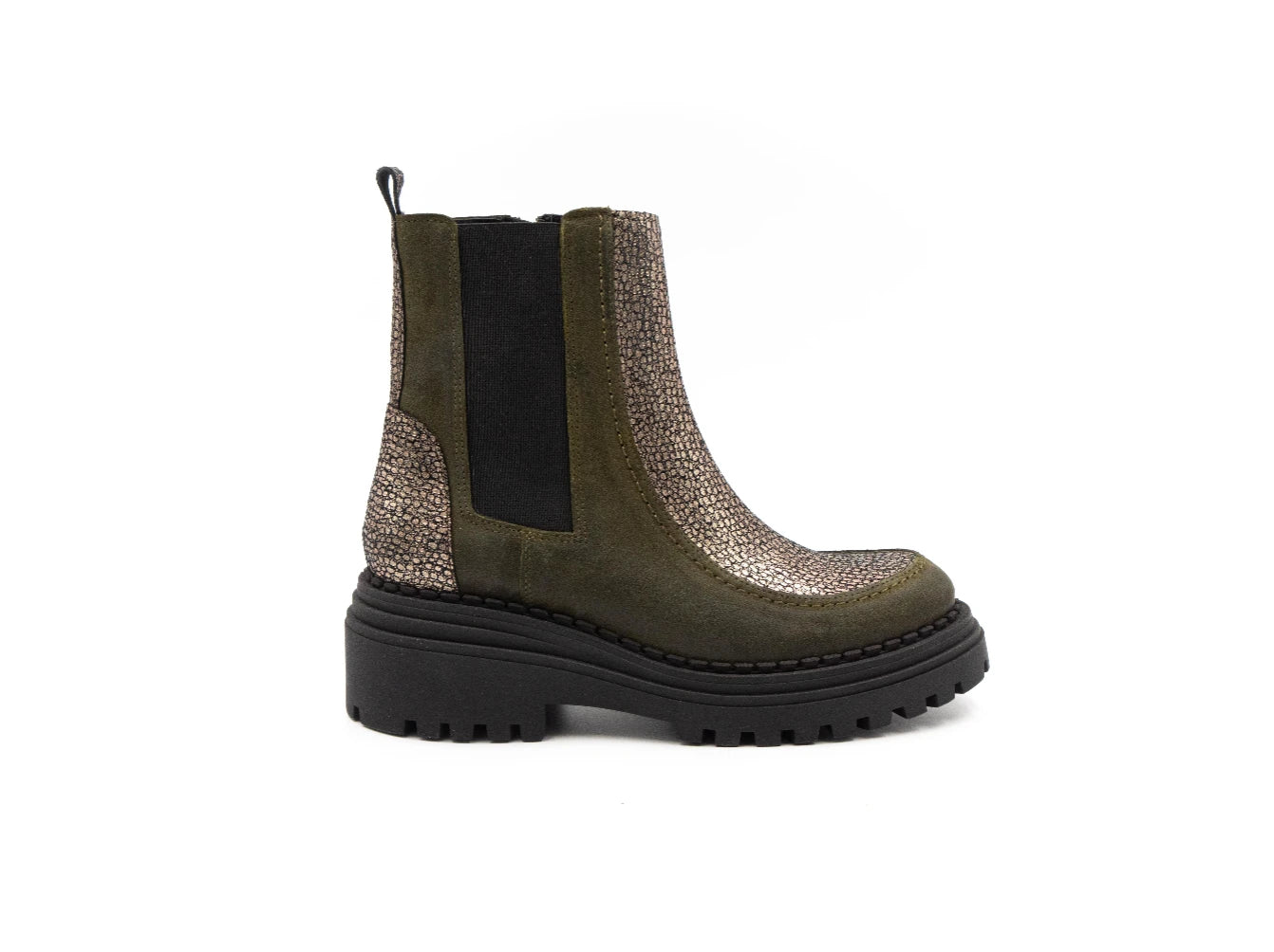 Green Chelsea boot with a patterned sole on a white background