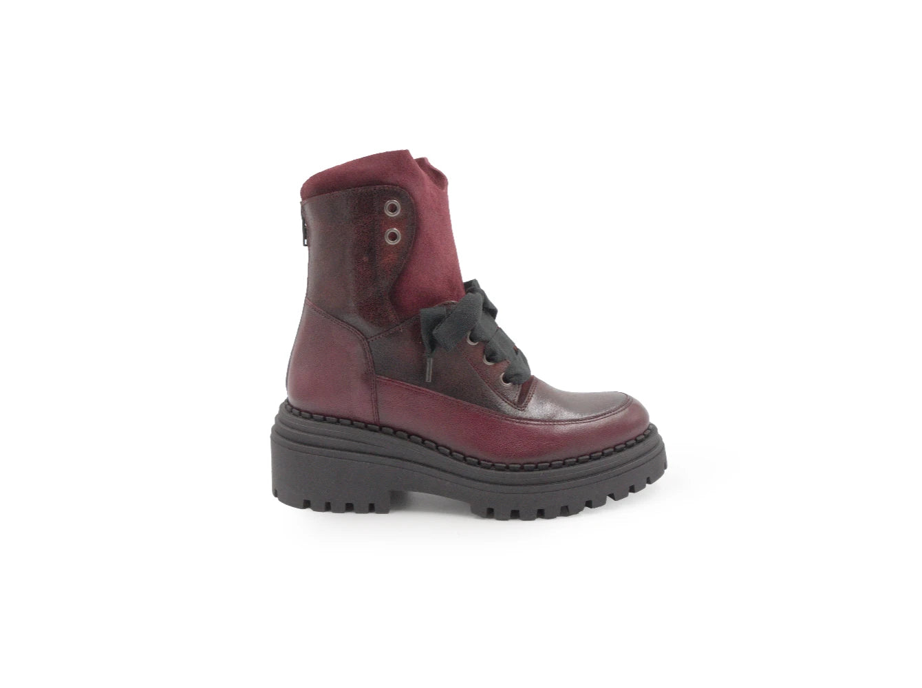 Maroon boot with black sole on a white background