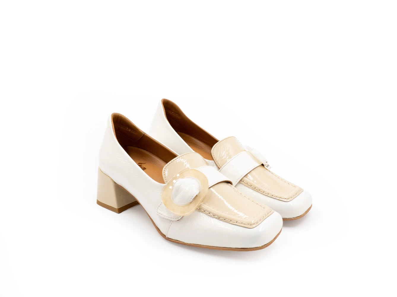 White shoes with beige straps on a white background