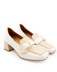 White shoes with beige straps on a white background