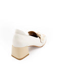 White shoe with a beige block heel on a white background