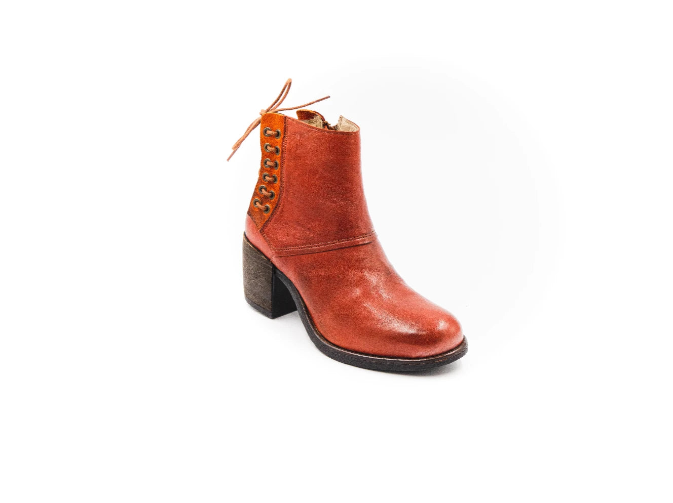 Brown leather boot with a textured sole on a white background