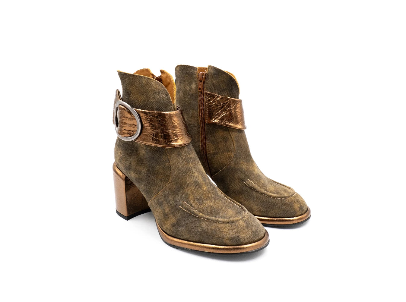 Pair of brown leather boots with gold accents on a white background