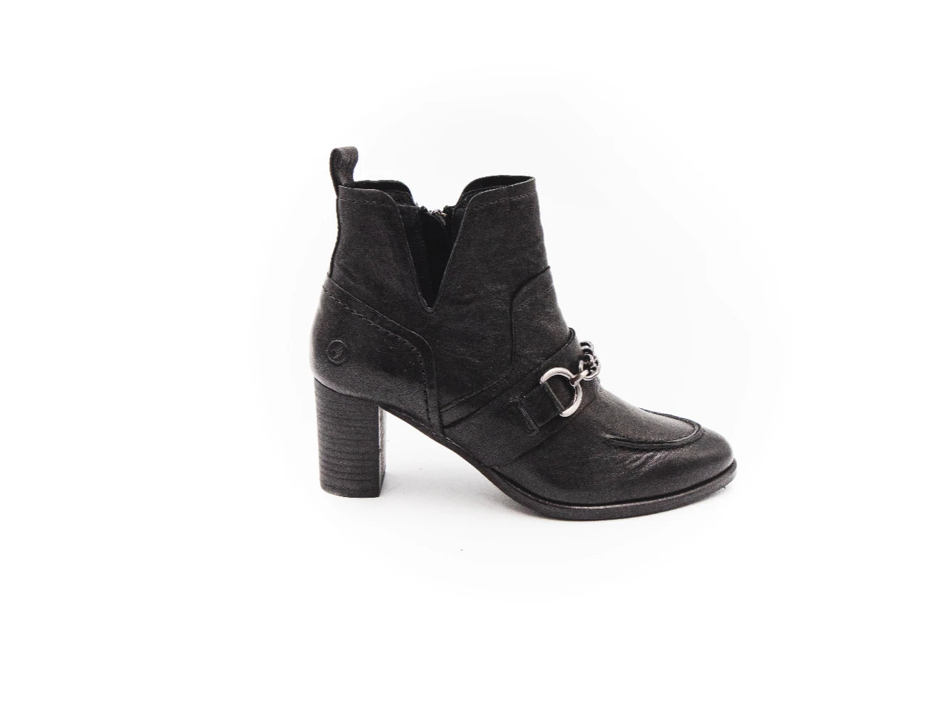 Black ankle boot with a decorative buckle on a white background