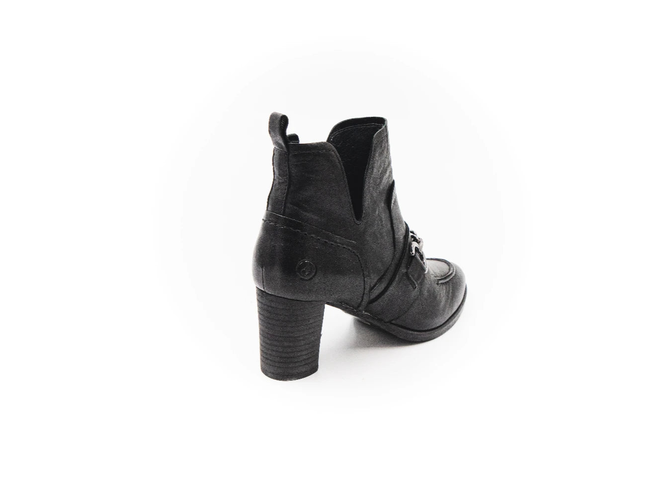 Black leather boot on a white background