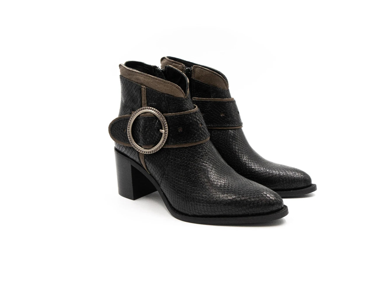 Pair of black textured boots with a circular buckle on a white background