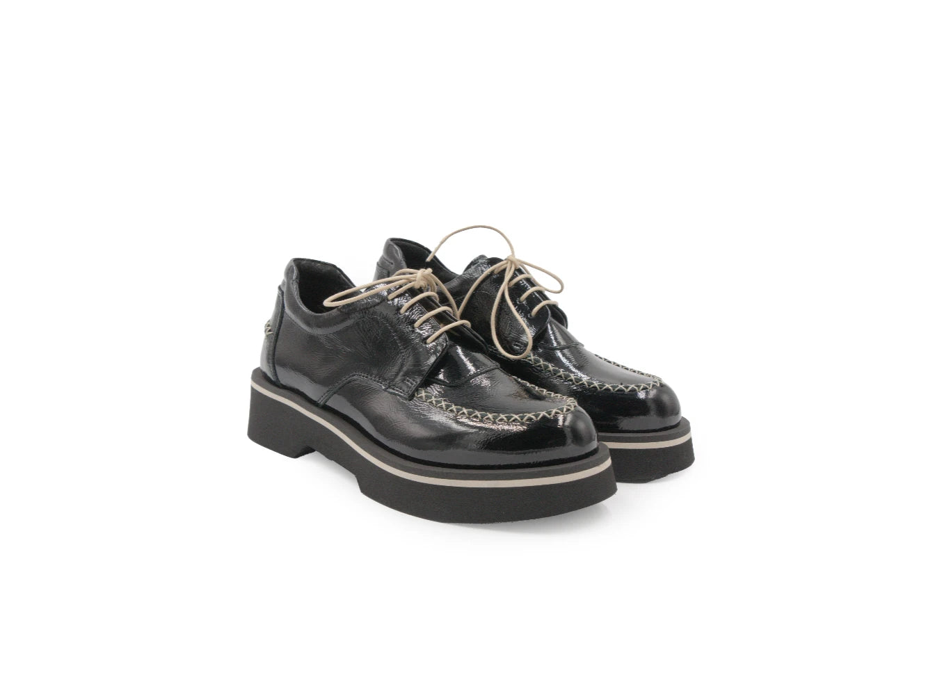 Pair of black leather shoes on a white background