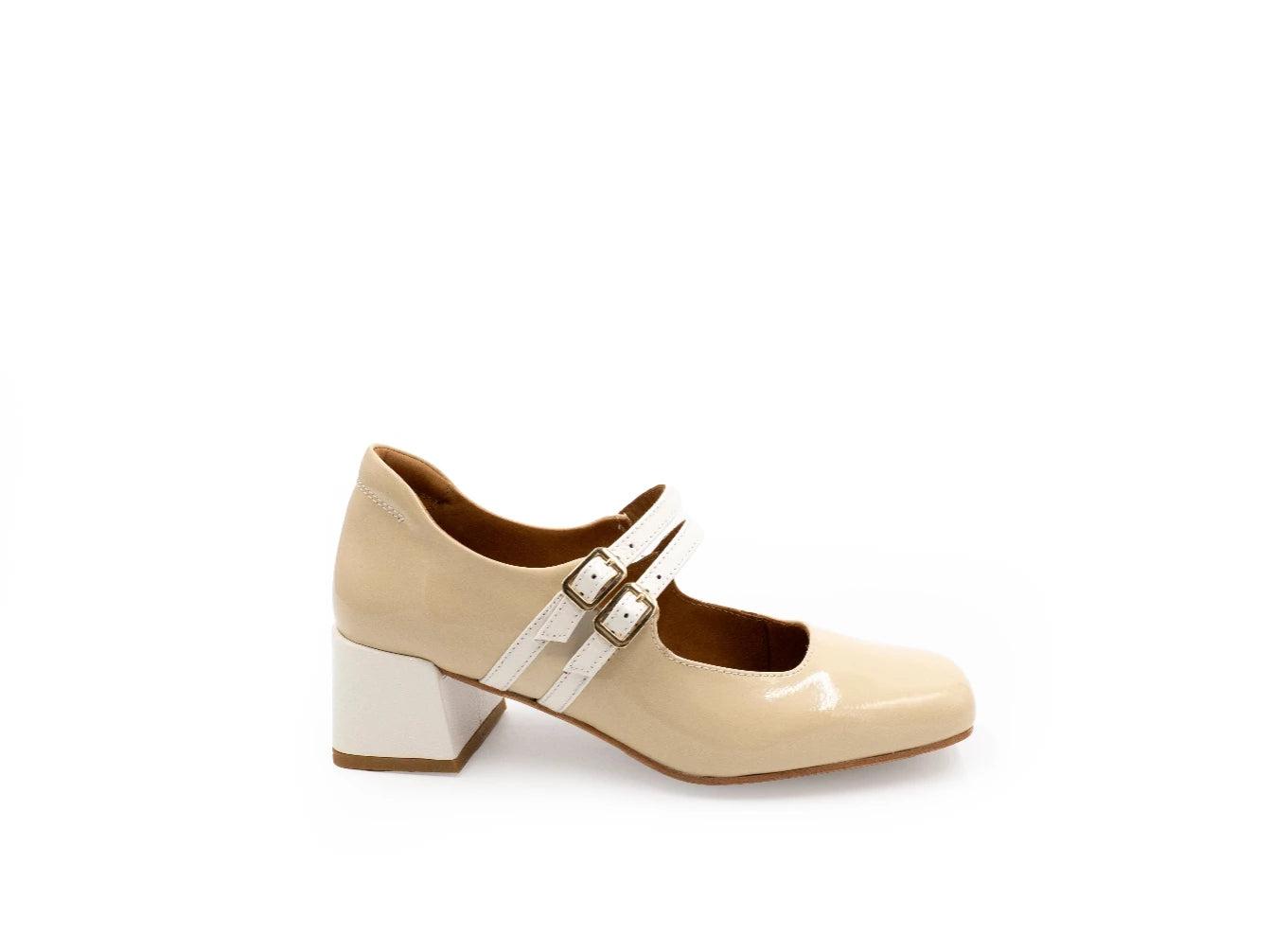 Beige shoe with a block heel on a white background