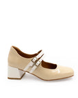 Beige shoe with a block heel on a white background