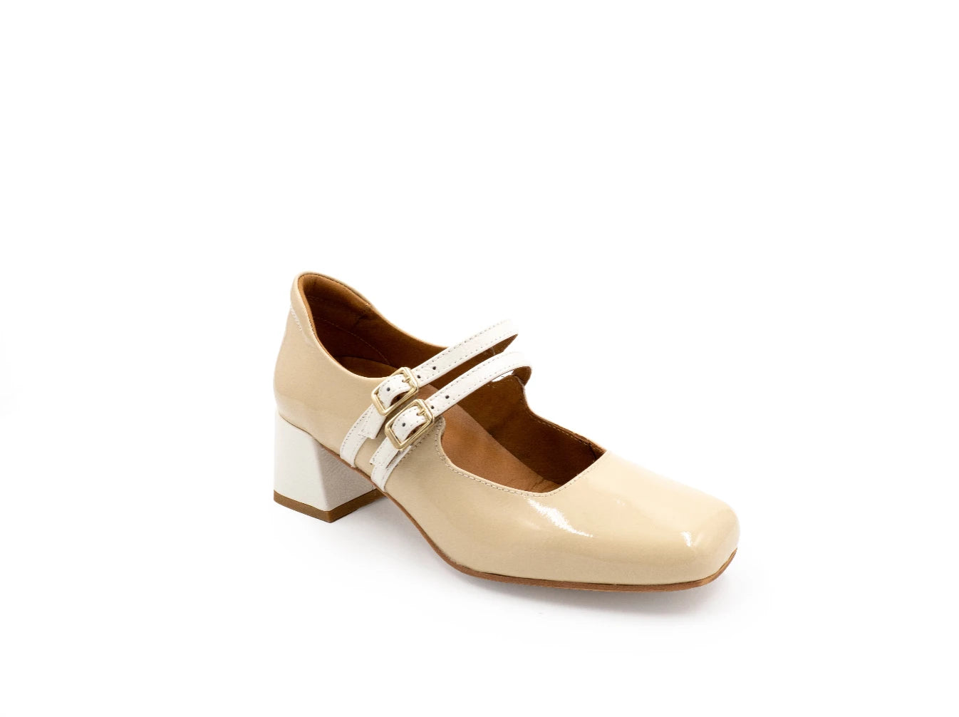 Beige shoe with a white strap on a white background